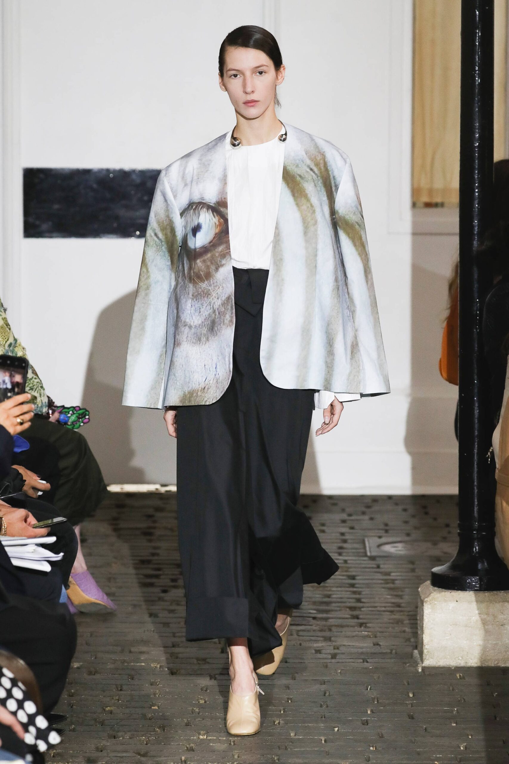 printed silk cape with blouse and tailored pants