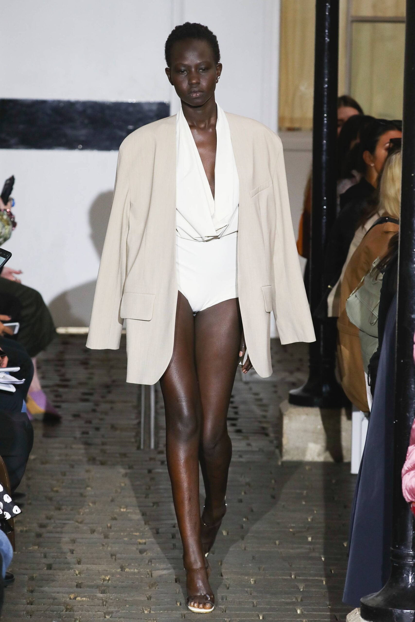 beige oversized blazer and white bodysuit