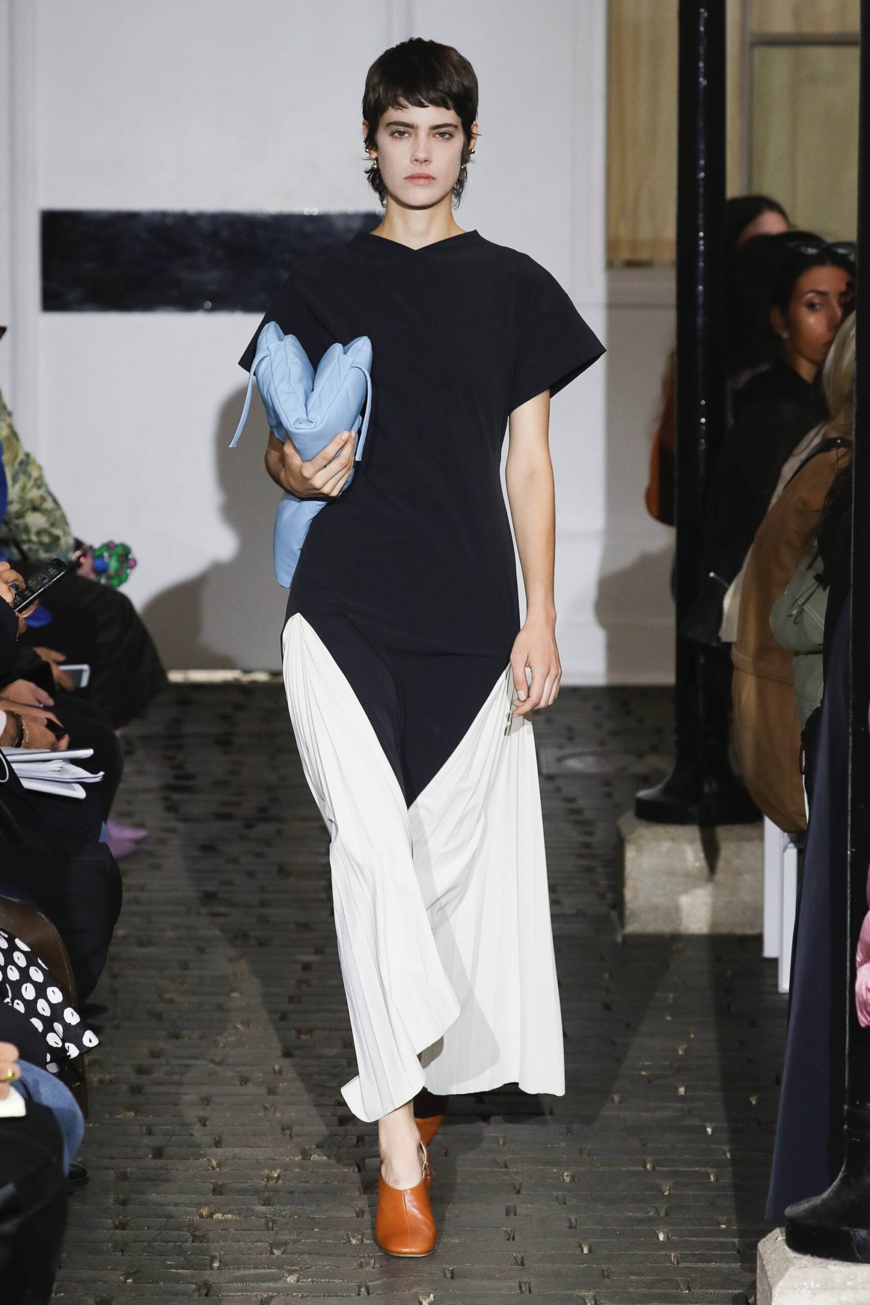 black top with white pants