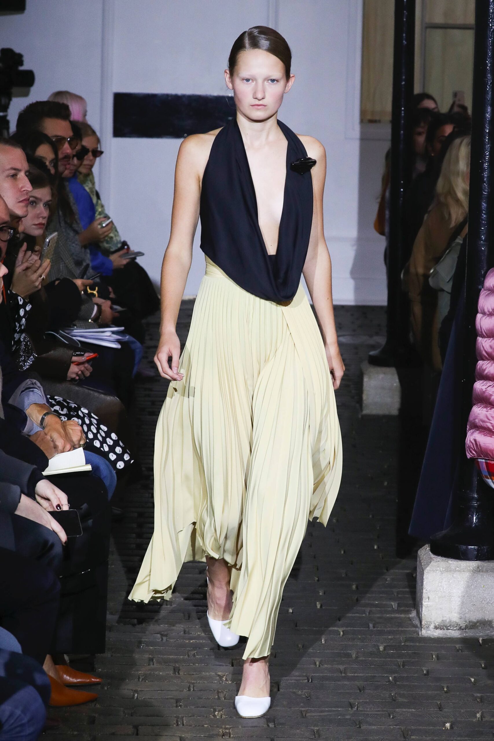 black and yellow pleated dress