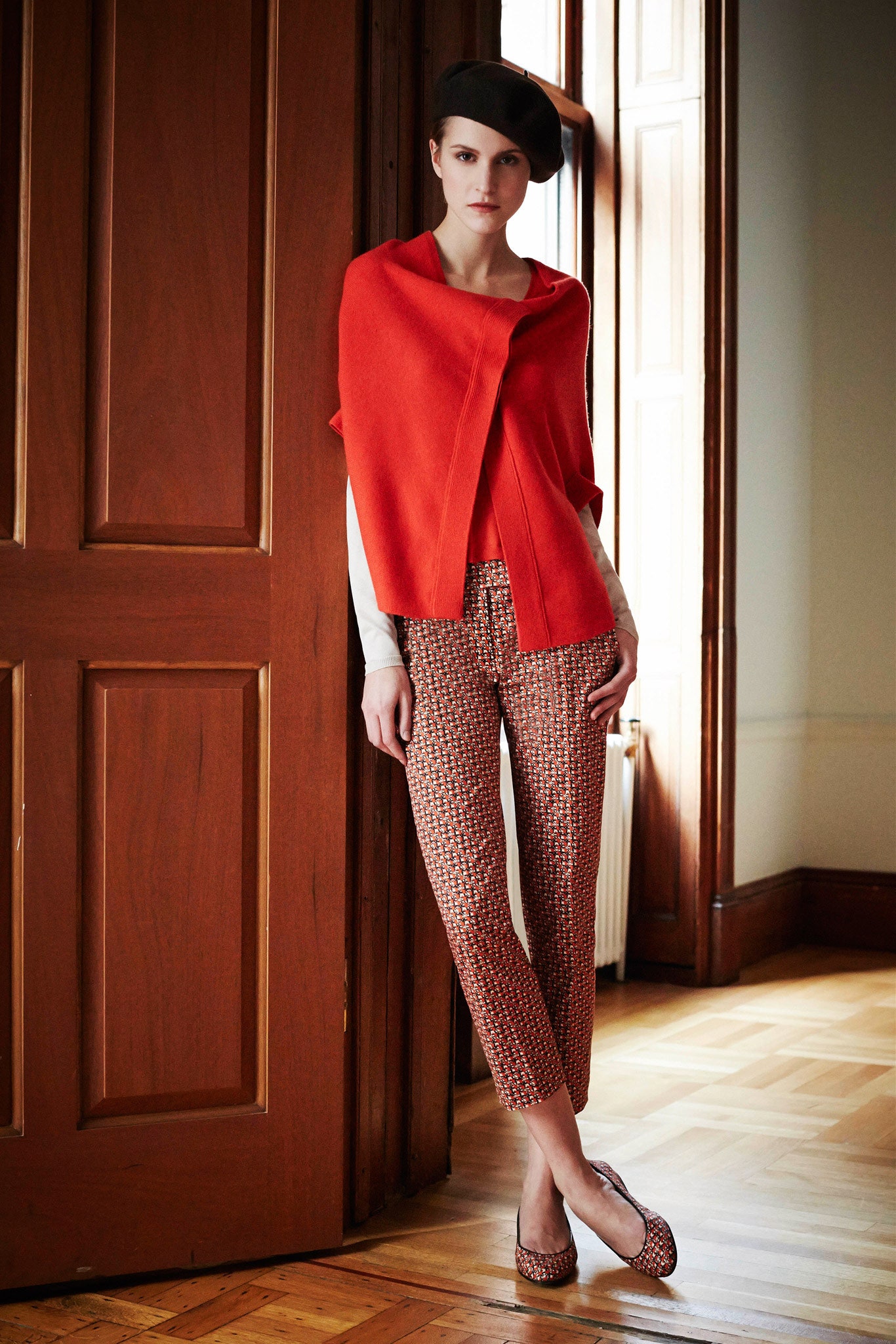 red relaxed top with multi pants