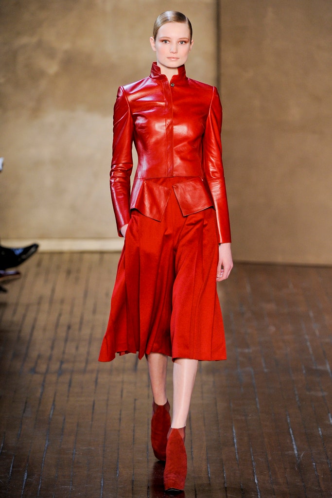 red leather fitted jacket and skirt