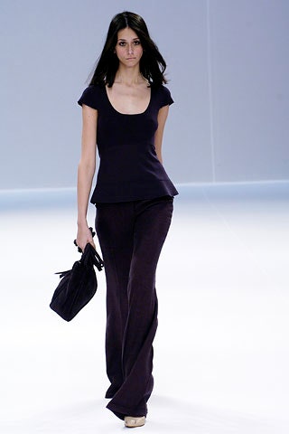 black fitted top and flared pants