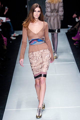 brown fitted top with beige skirt