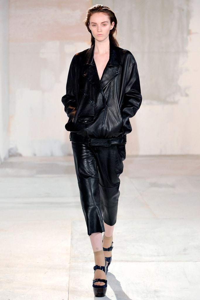 black leather relaxed jacket and fitted skirt