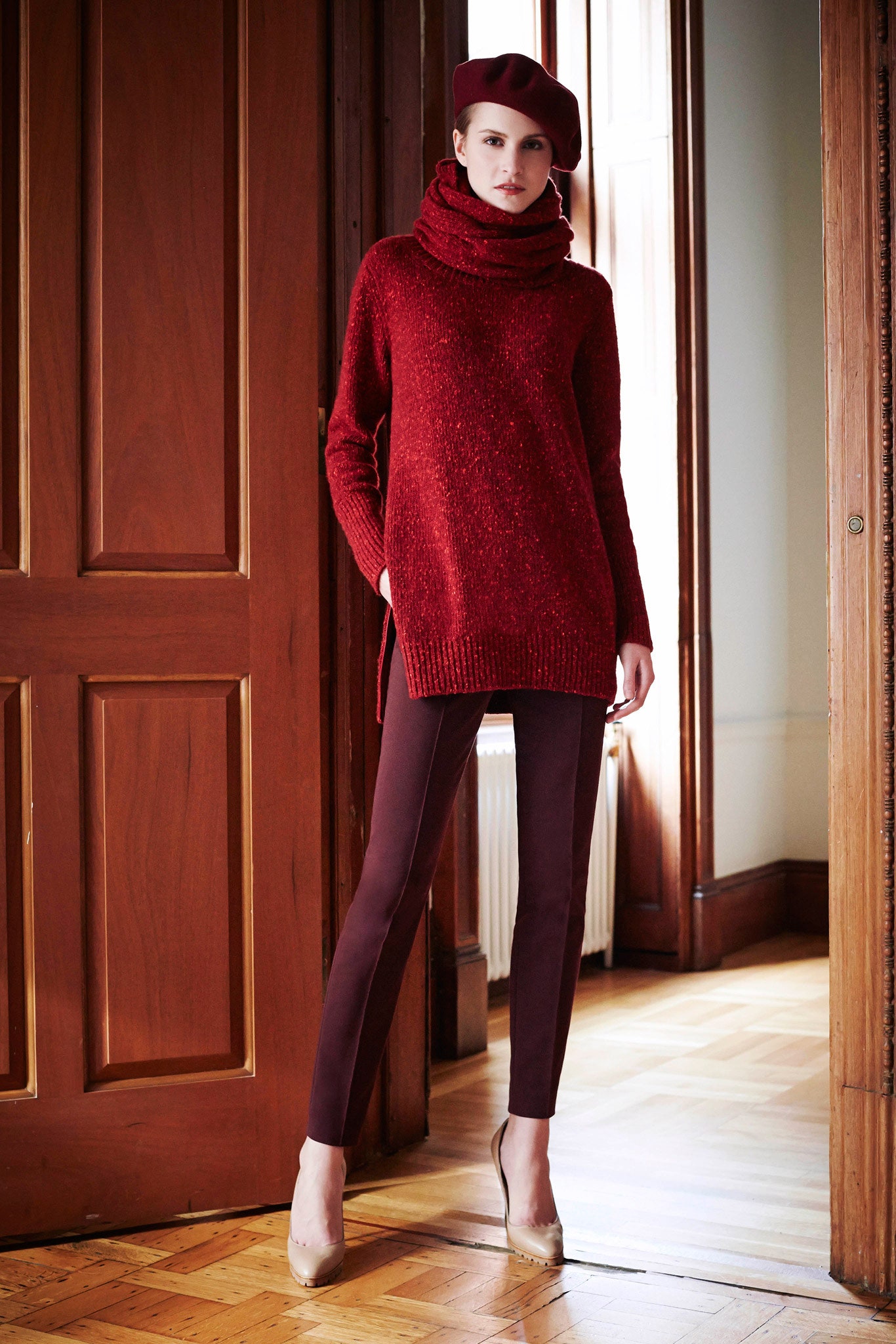 red wool sweater with brown pants