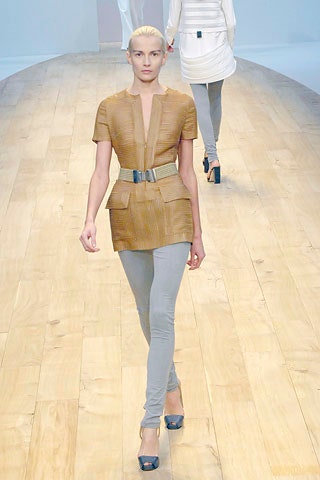 brown fitted top with gray pants