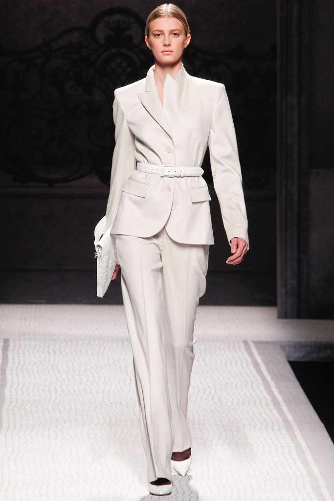 white tailored suit with clutch