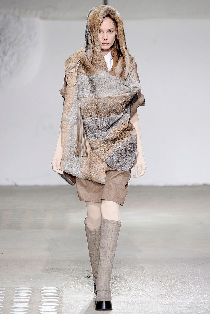 brown fur poncho with beige skirt