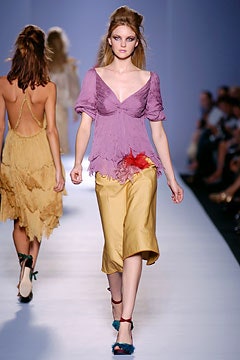 purple silk top with yellow skirt