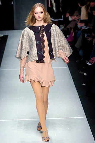 beige wool cape and pink silk dress