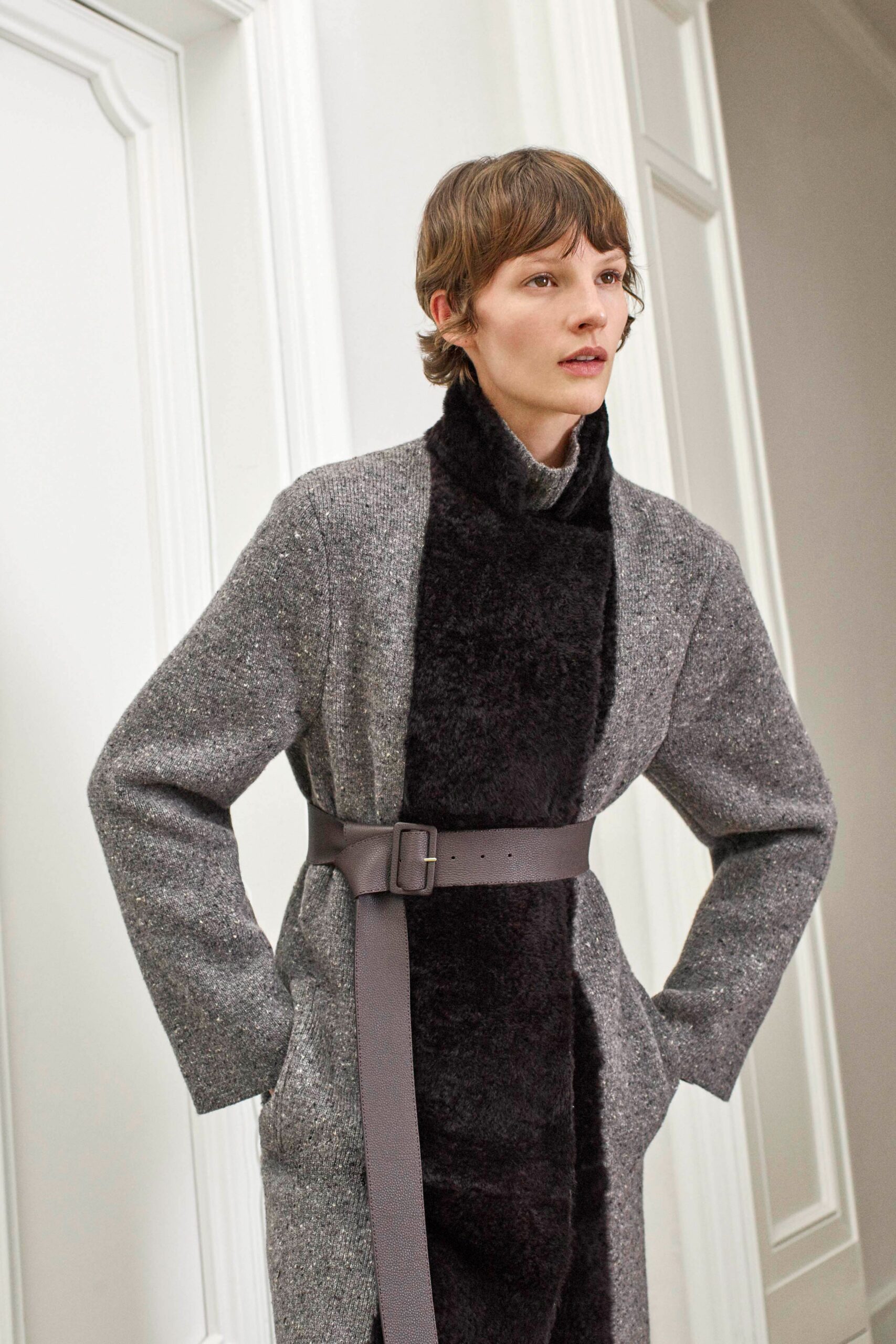 gray and black belted coat