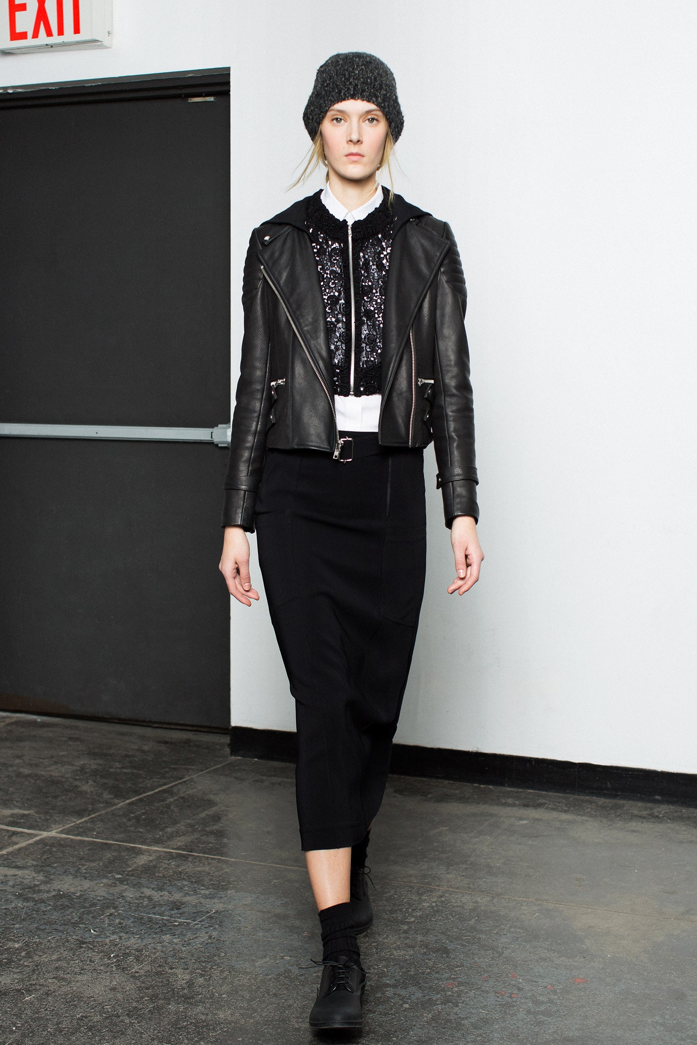 black leather jacket with sequined blouse
