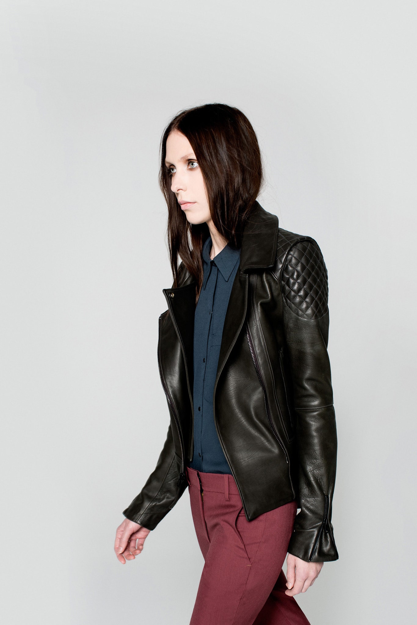 black leather long-sleeve collared fitted quilted jacket
