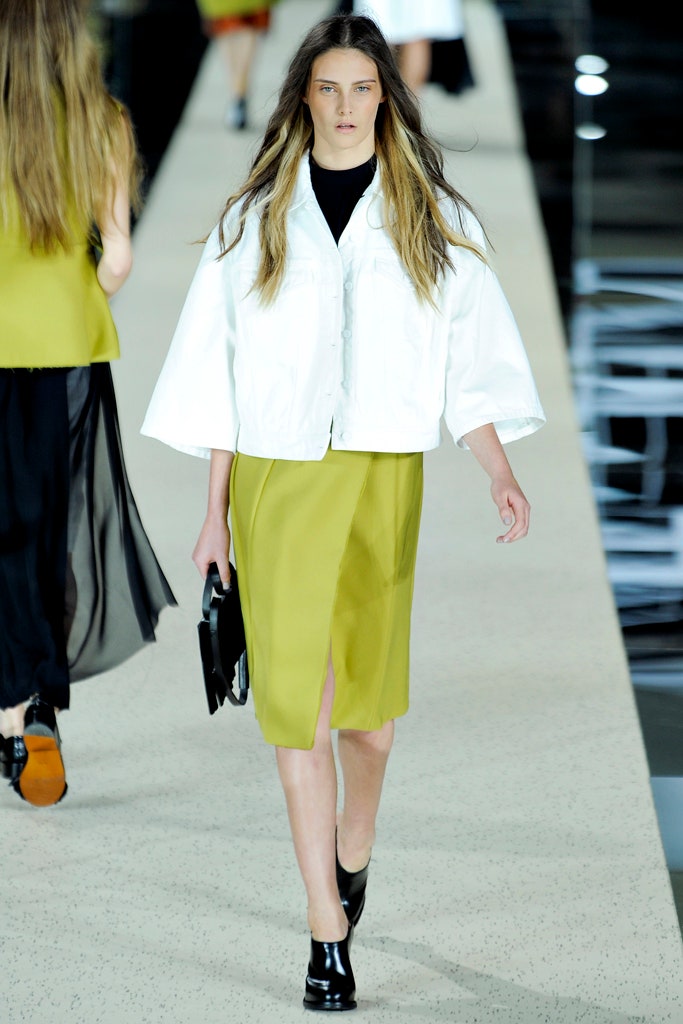 white relaxed jacket with green skirt