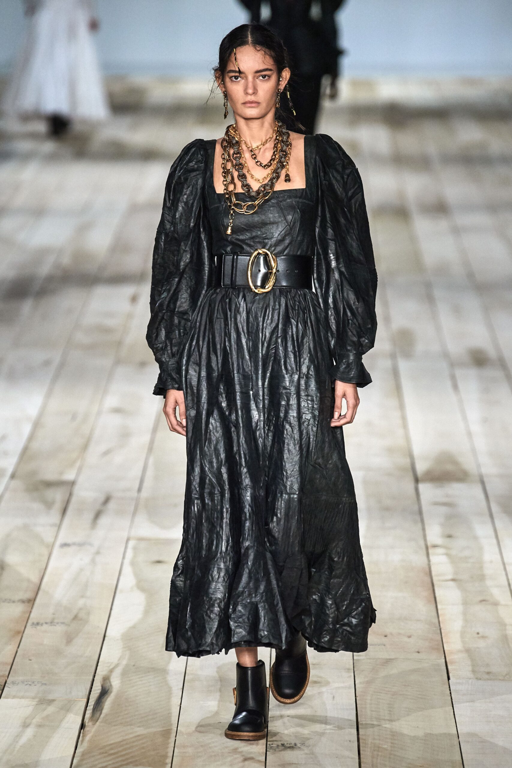 black leather midi dress with accessories