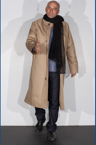 beige coat with black scarf