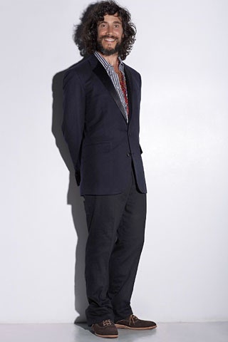 black tailored blazer with striped shirt