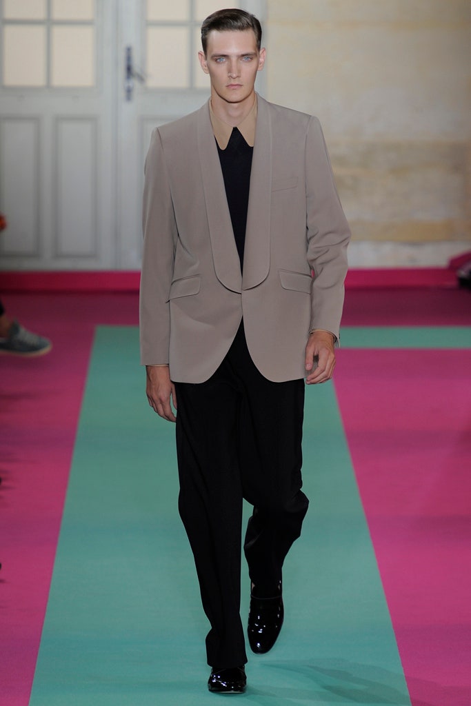 beige tailored blazer and black pants