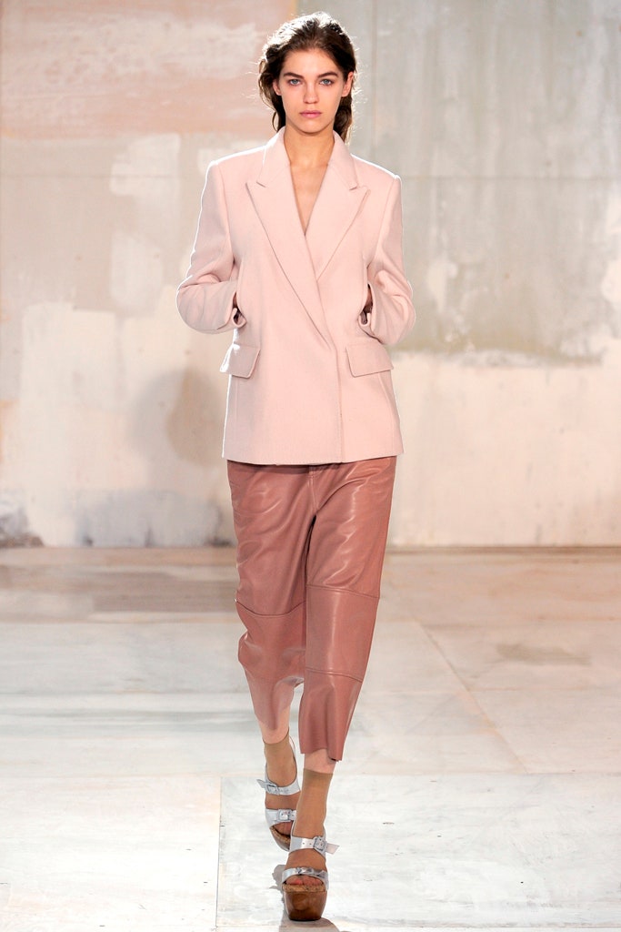 pink tailored blazer and brown leather pants