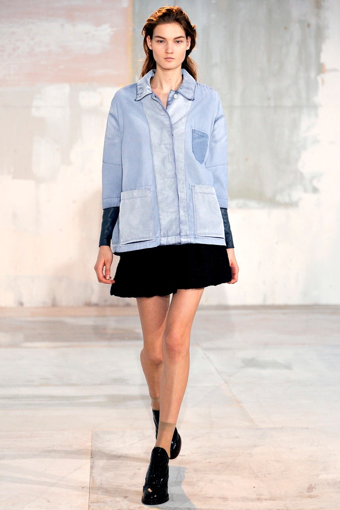 blue relaxed jacket with black skirt