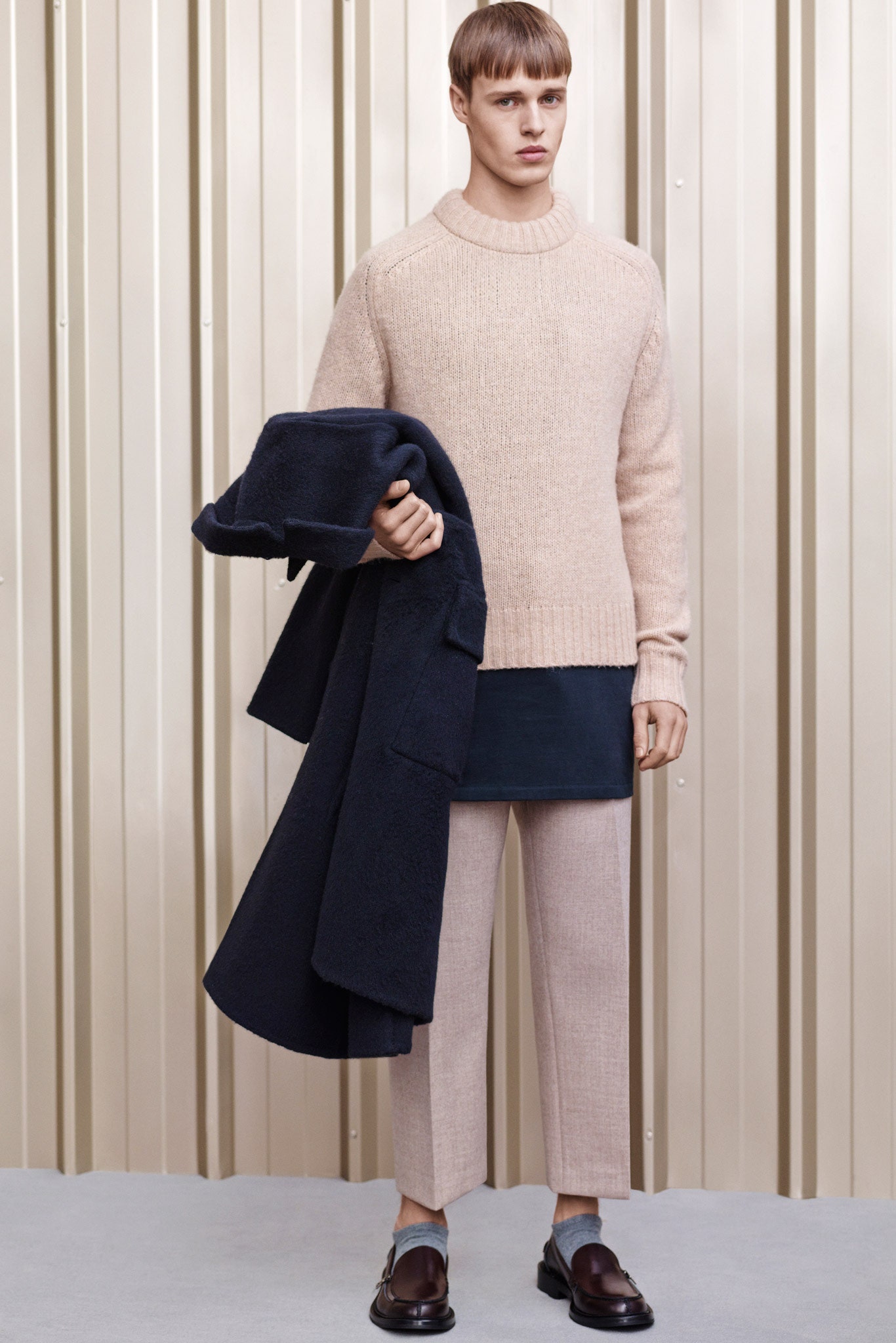 beige wool sweater with navy coat