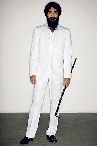 white tailored suit with black shoes