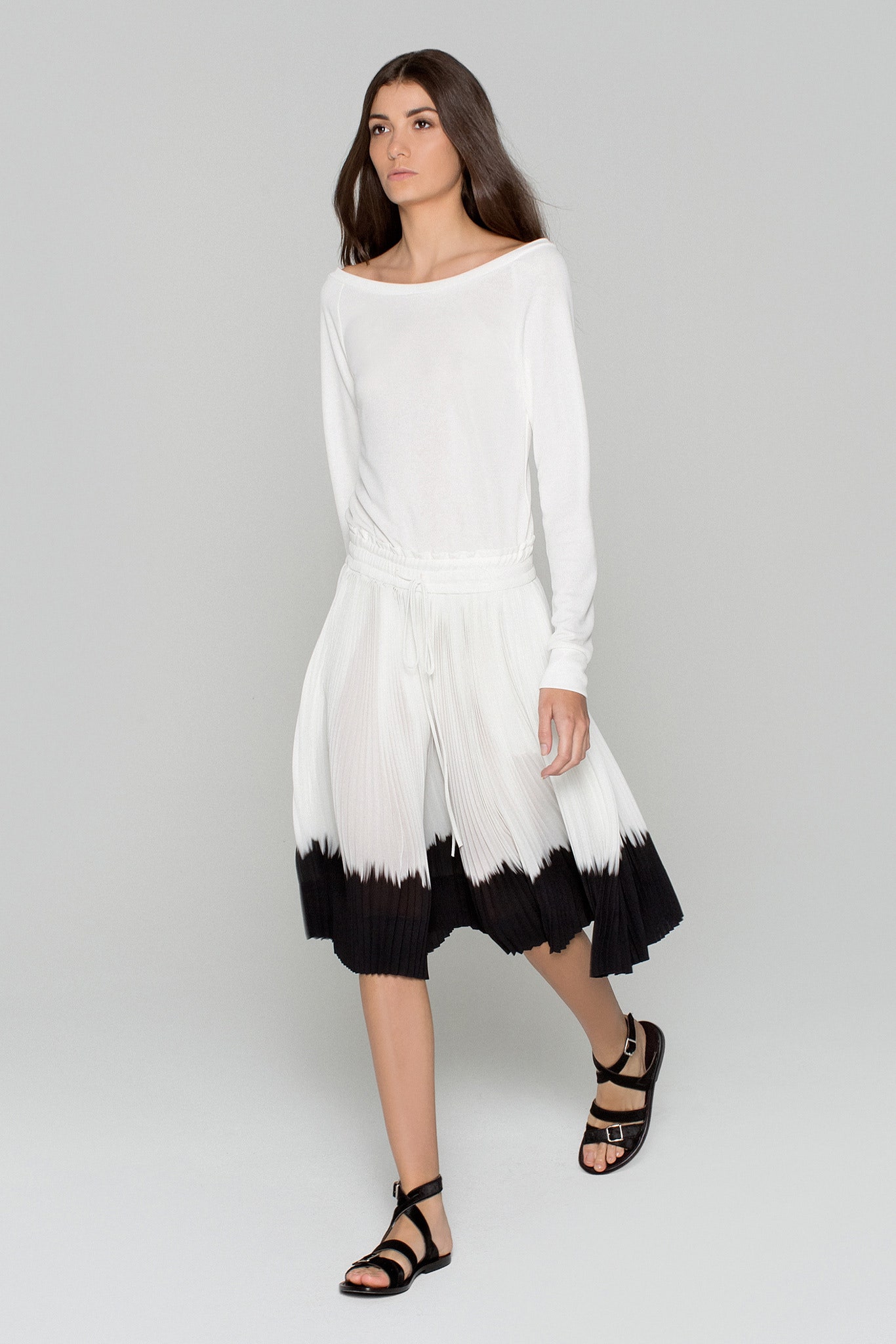 white relaxed top with pleated skirt