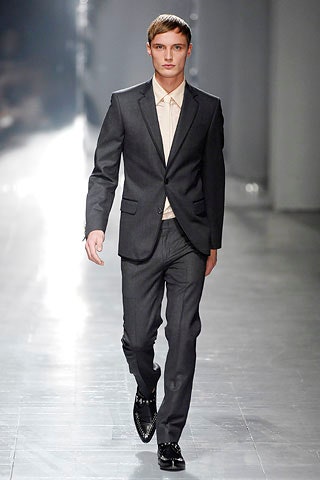 gray tailored suit with beige shirt