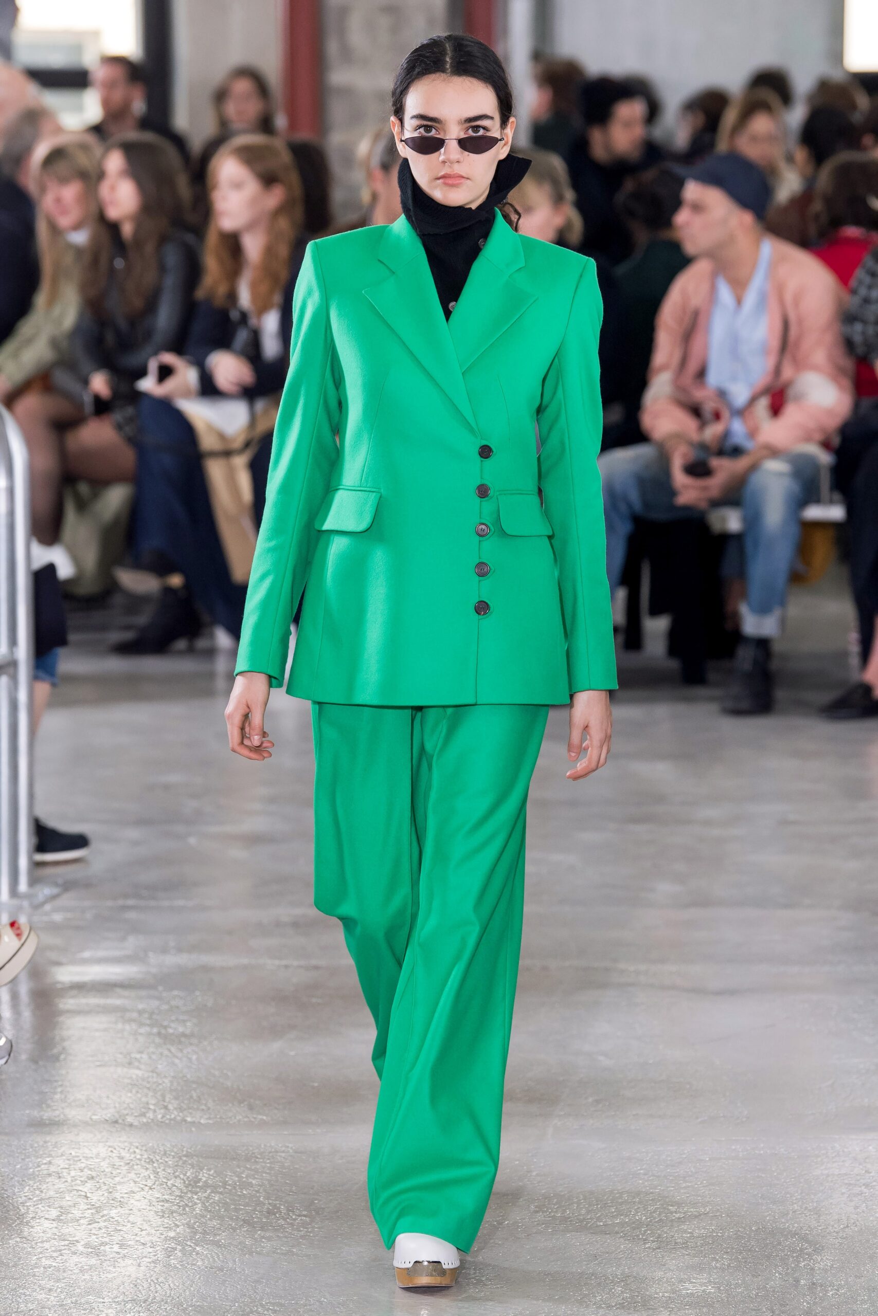green tailored suit