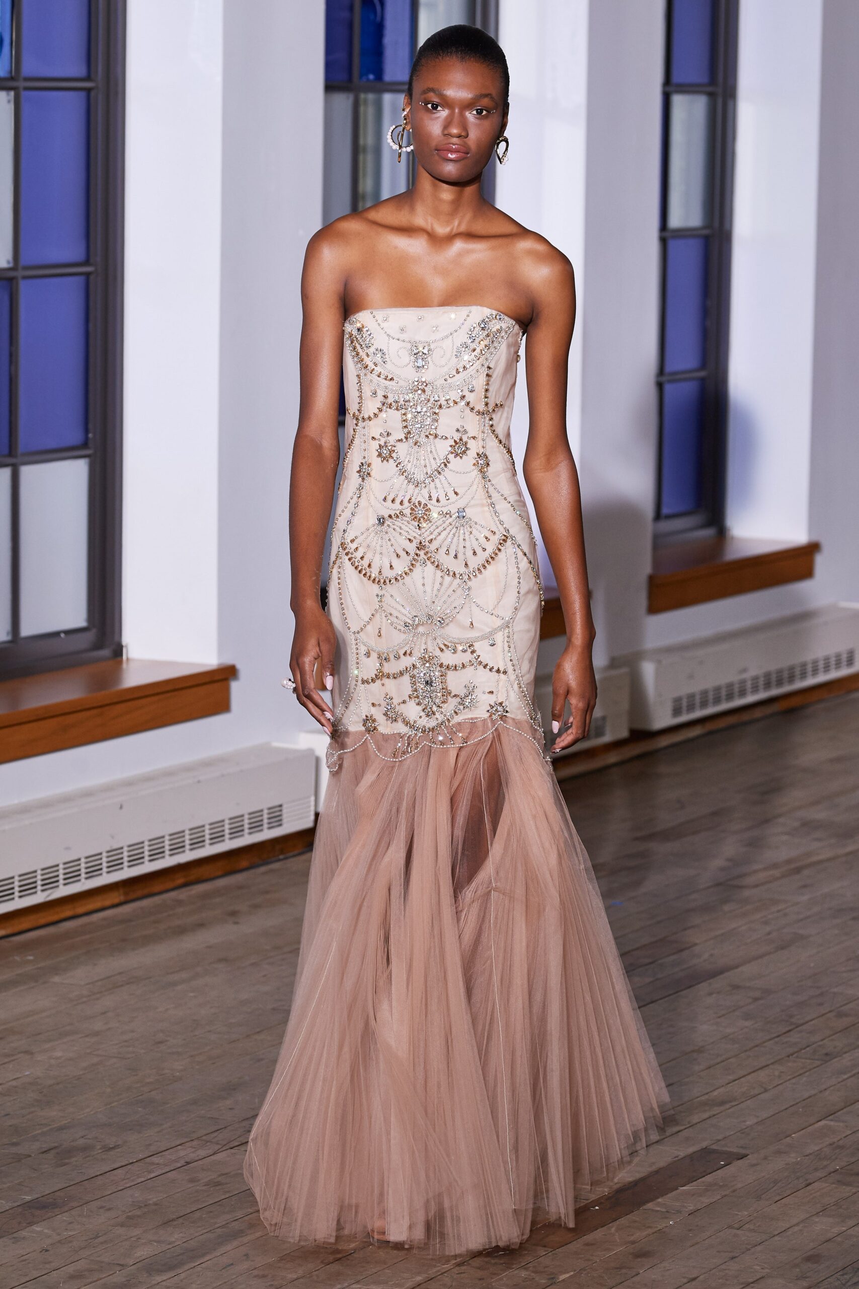beige embroidered strapless gown