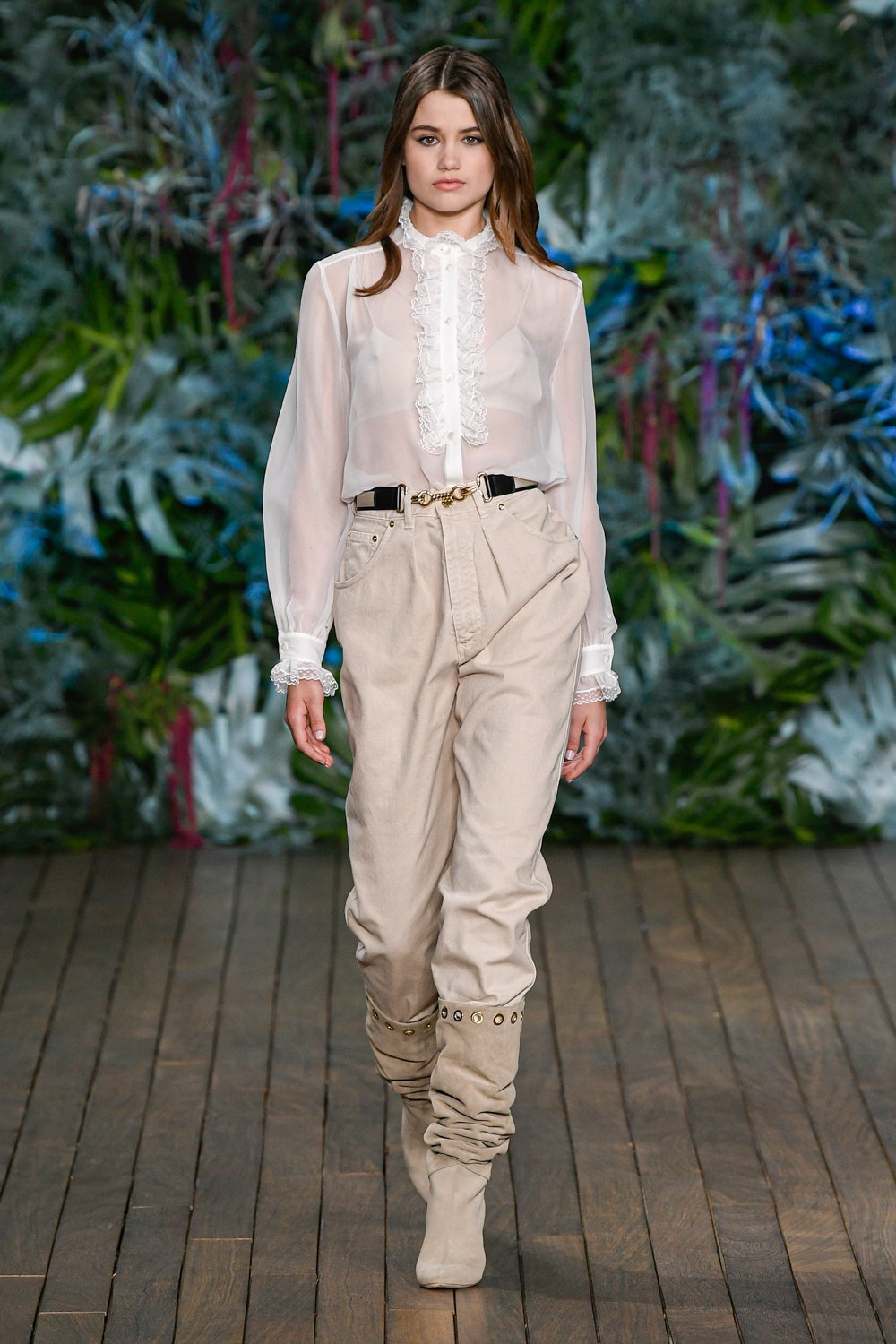 white silk blouse with beige pants