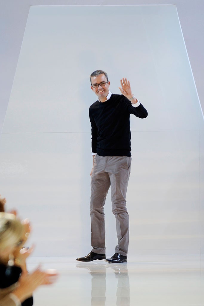 black wool sweater and beige pants