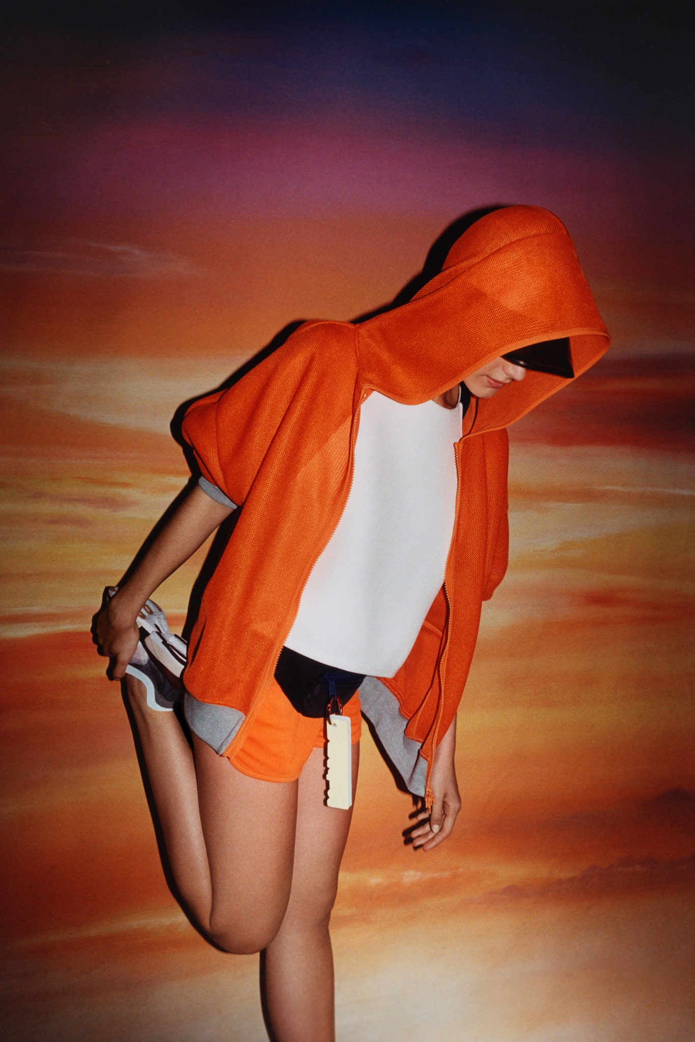 orange hoodie and shorts outfit