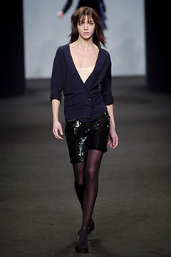 black fitted blouse and sequin skirt