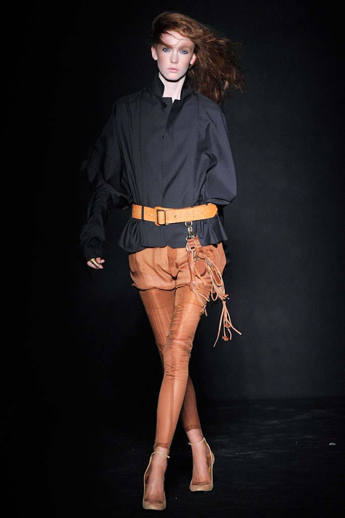 orange leather fitted high-waisted zippered pants