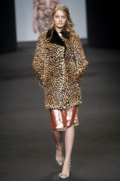 brown animal-print fur coat and sequin skirt