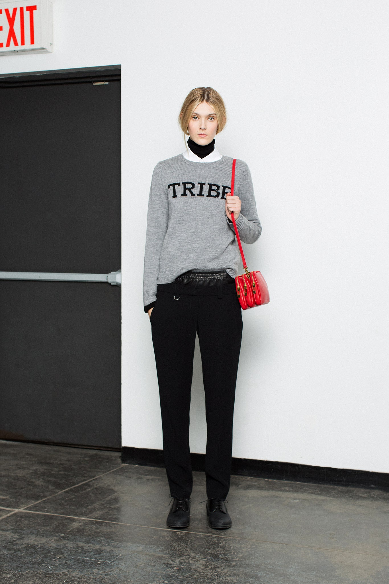 gray printed sweater with black pants