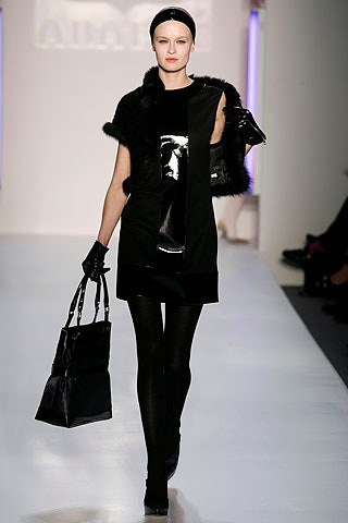 black leather mini dress with faux-fur cape