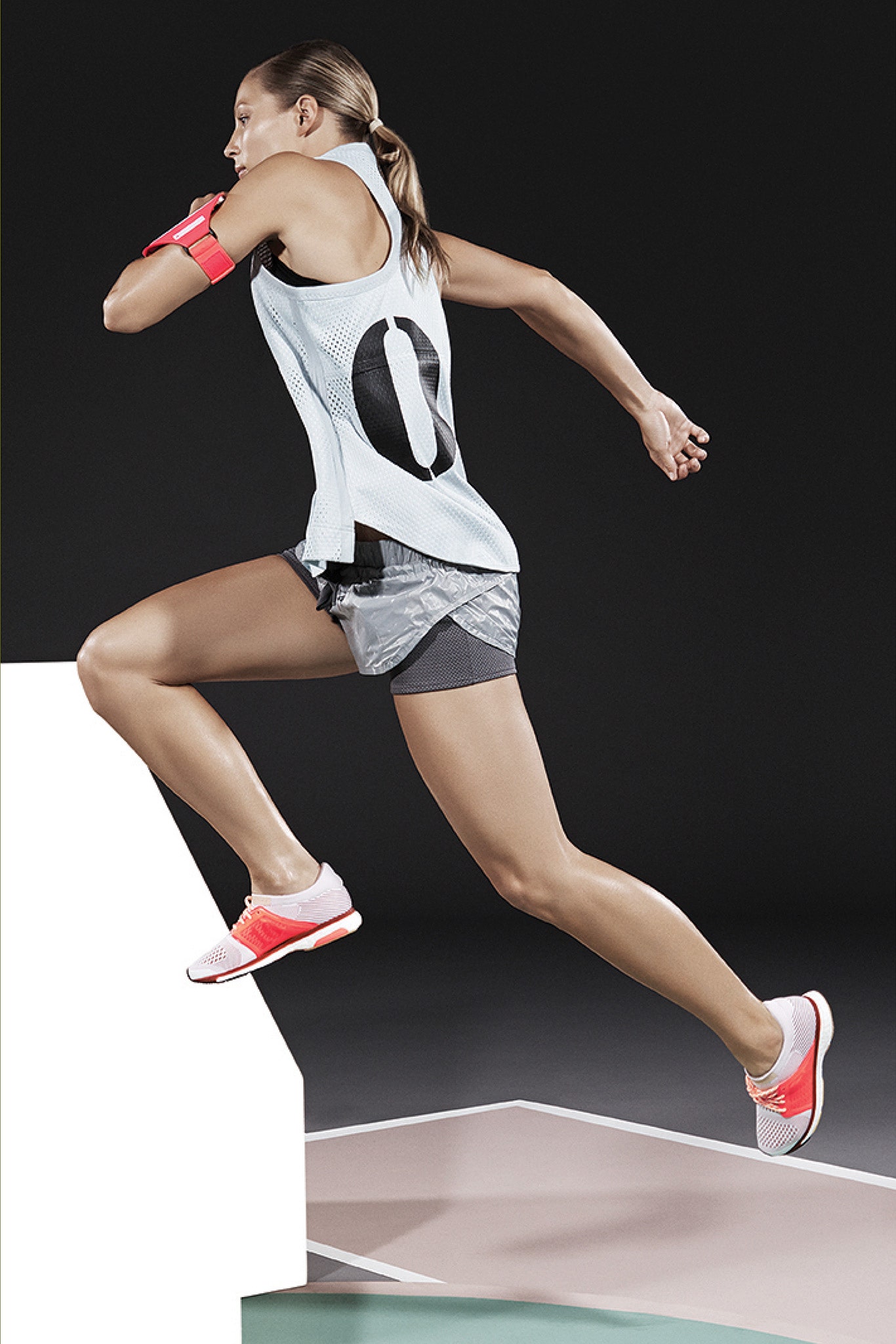 white mesh tank-top with gray shorts