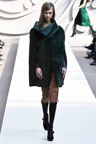 green fur cape with blue top