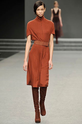 brown fitted midi dress with boots