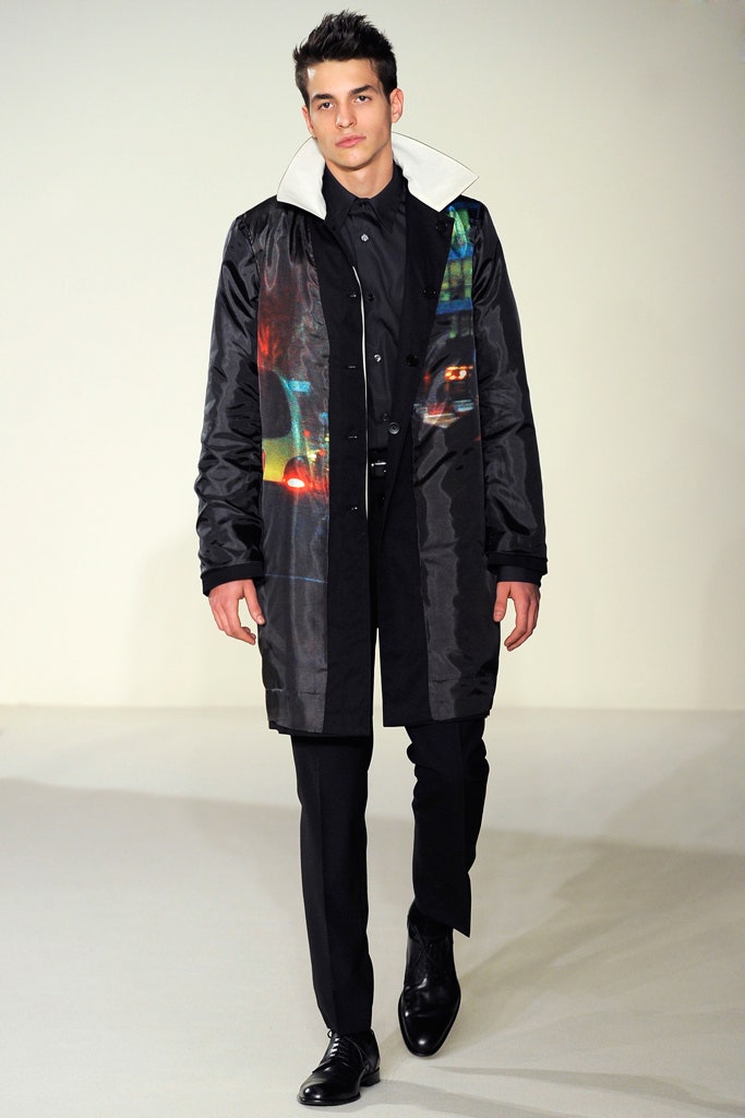 black vinyl coat and slim pants