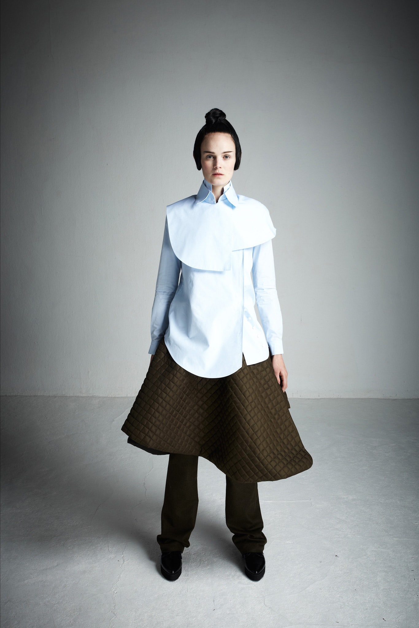 blue layered shirt with brown skirt