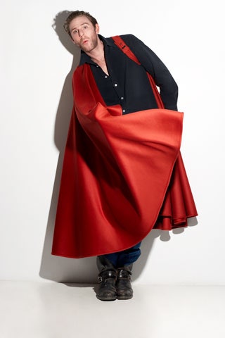red silk cape with black shirt