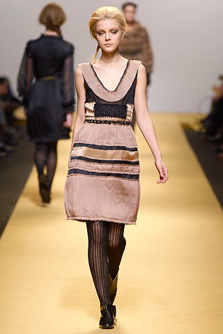 black and beige pleated dress