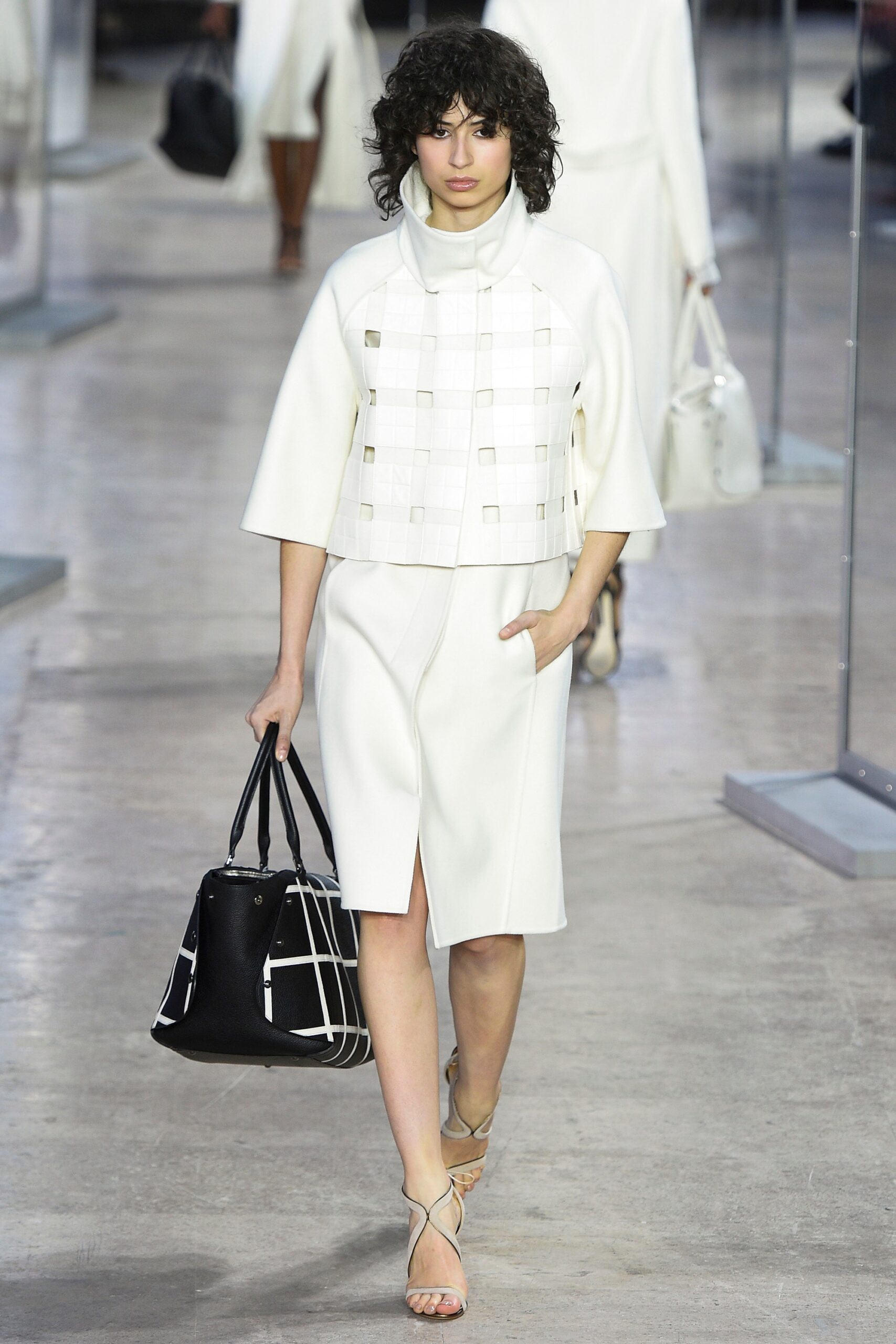white cotton short-sleeve collared structured buttoned layered jacket