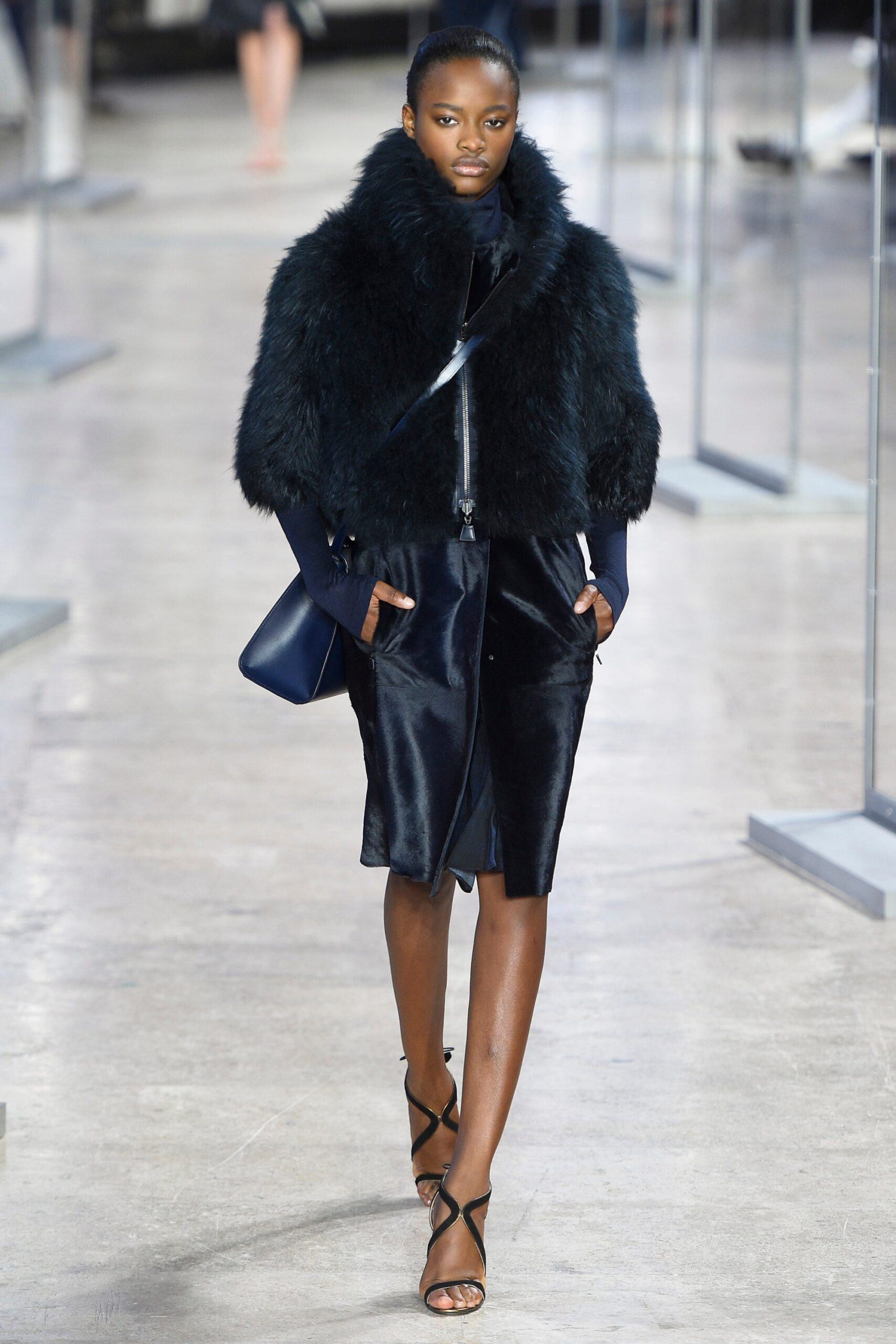 black faux-fur coat with silk skirt