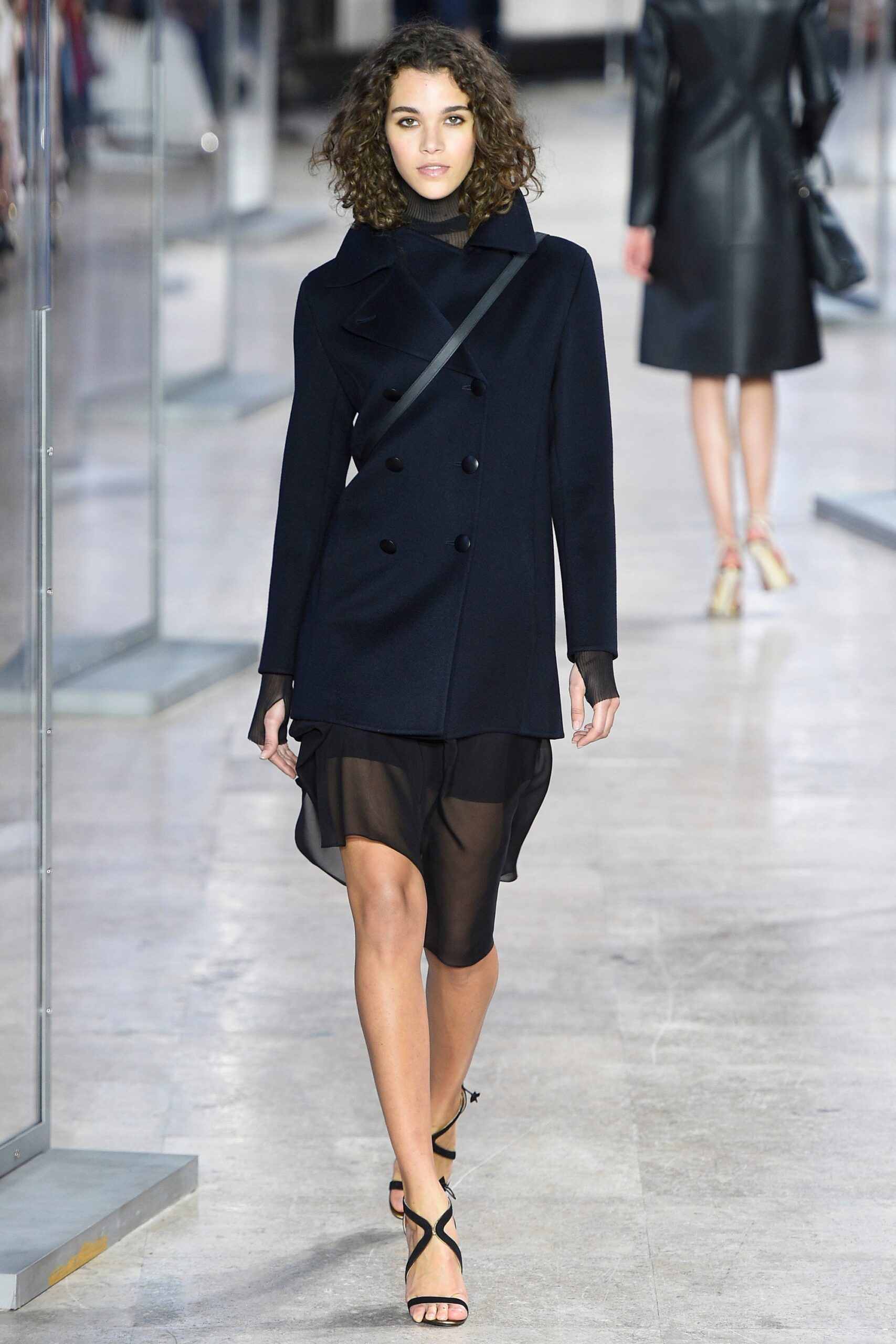 black wool coat with sheer dress