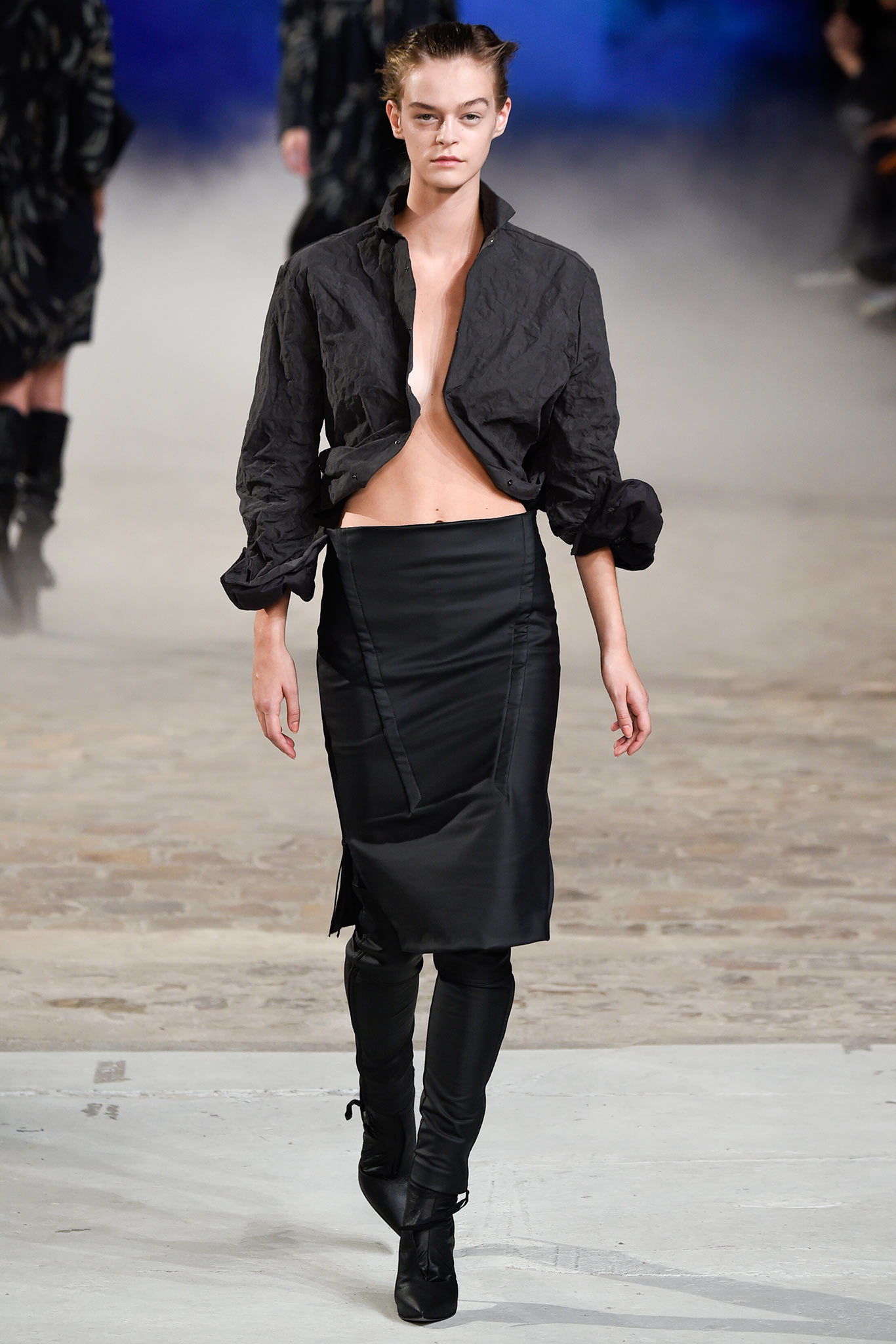 black relaxed shirt and fitted skirt